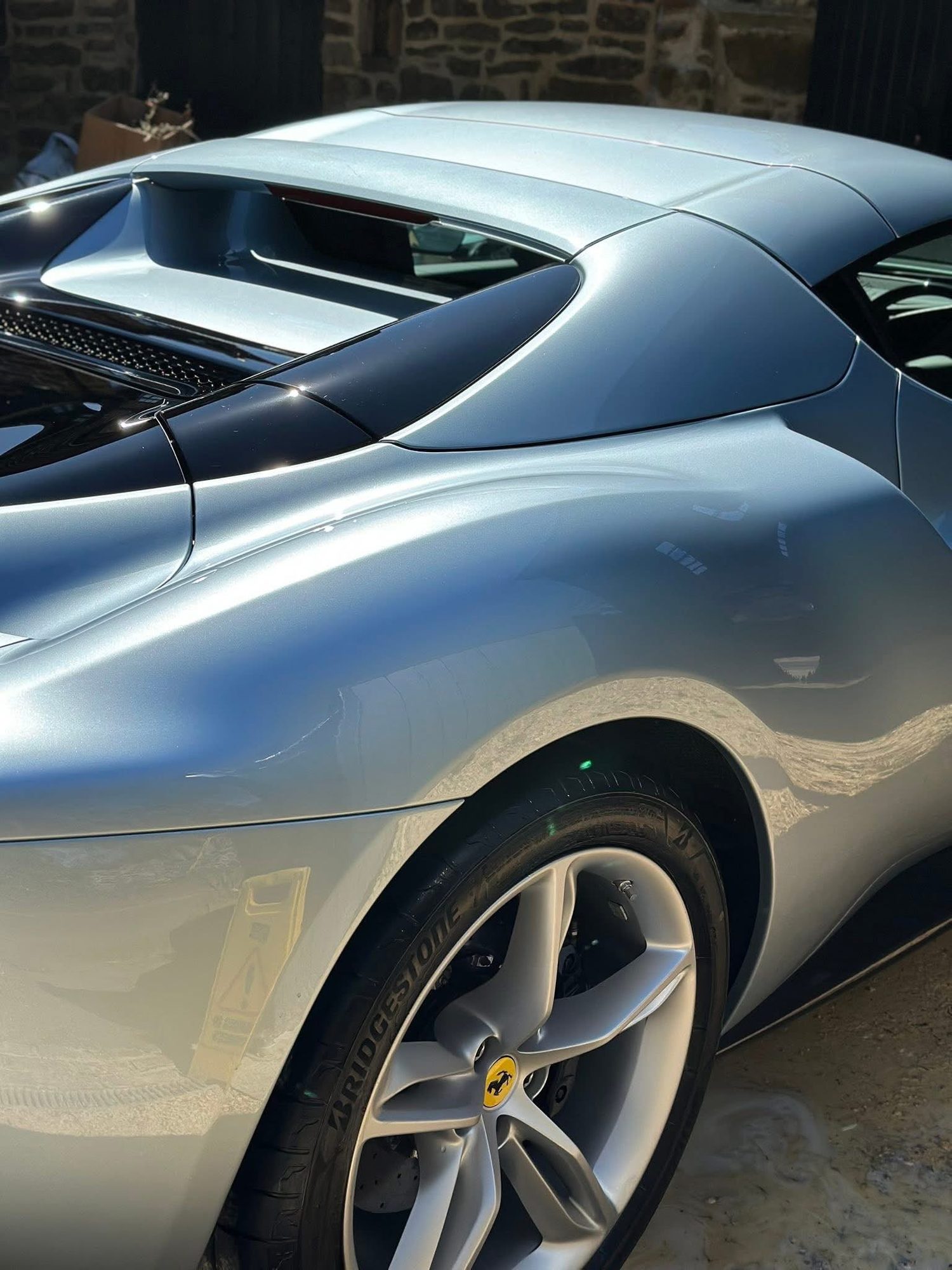 Ferrari 296 GTS shown in the supplied scratch removal photos