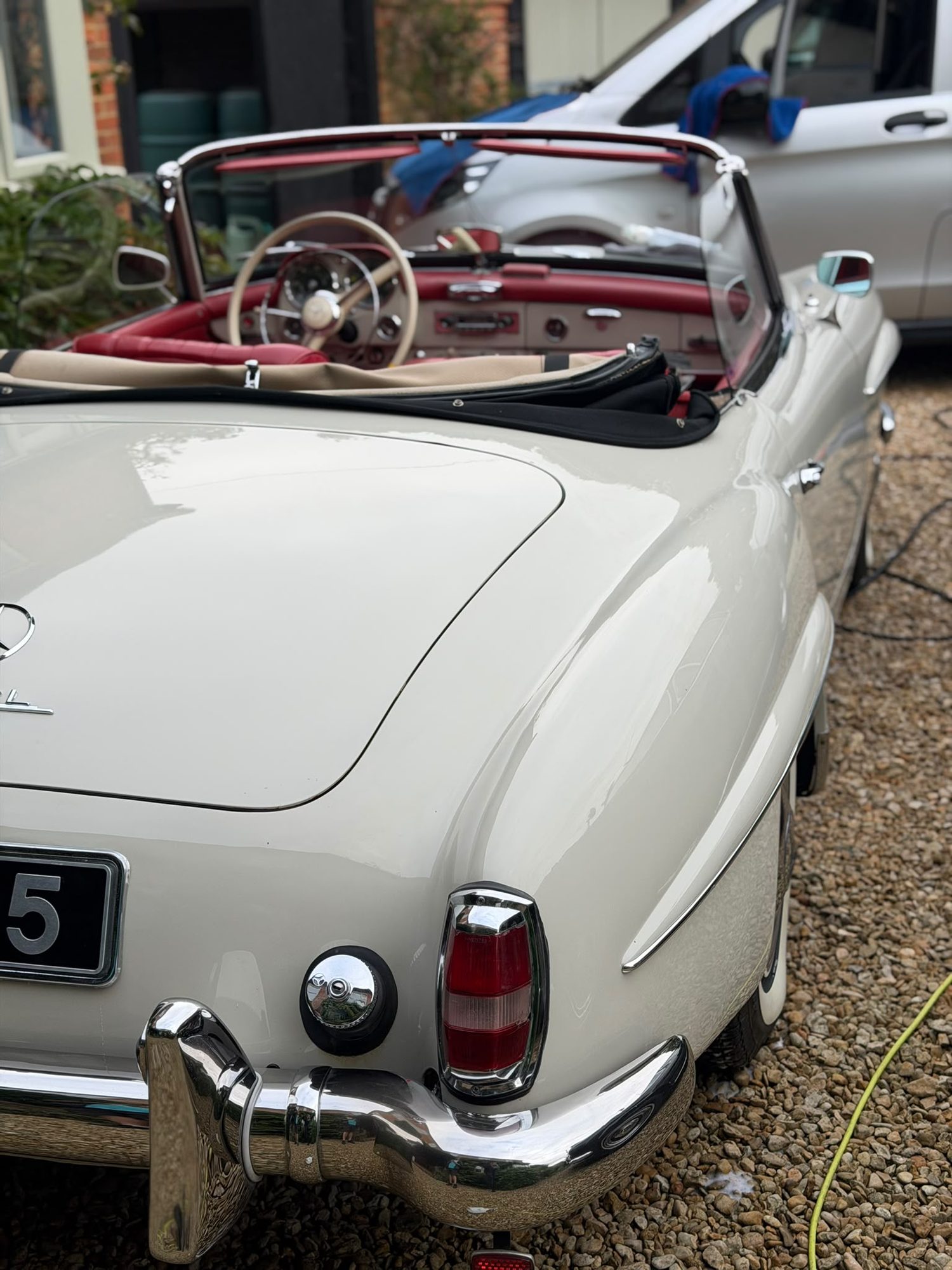 Mercedes 190sl shown in the supplied convertible roof cleaning photos
